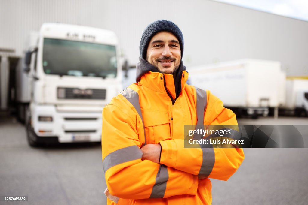 Shipping yard worker standing outdoors