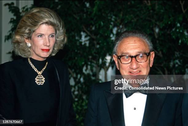 Portrait of married couple, philanthropist Nancy Kissinger and former US Secretary of State Henry Kissinger, as they arrive at the White House for a...