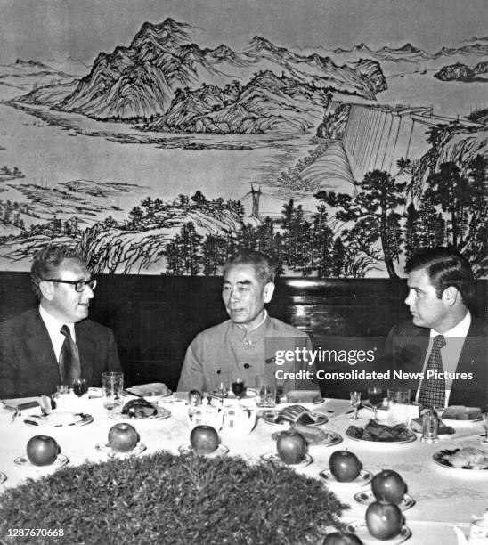 View of, from left, US National Security Advisor Henry Kissinger, Chinese Premier Chou En-lai , and Deputy Assistant to the US President Dwight...