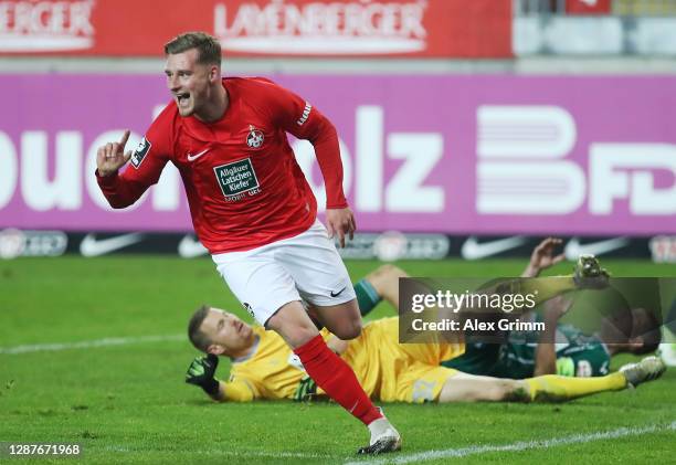 Marlon Ritter of Kaiserslautern celebrates his team's first goal during the 3. Liga match between 1. FC Kaiserslautern and VfB Luebeck at...