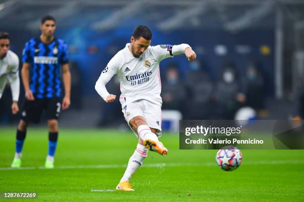 Eden Hazard of Real Madrid scores their team's first goal from the penalty spot during the UEFA Champions League Group B stage match between FC...