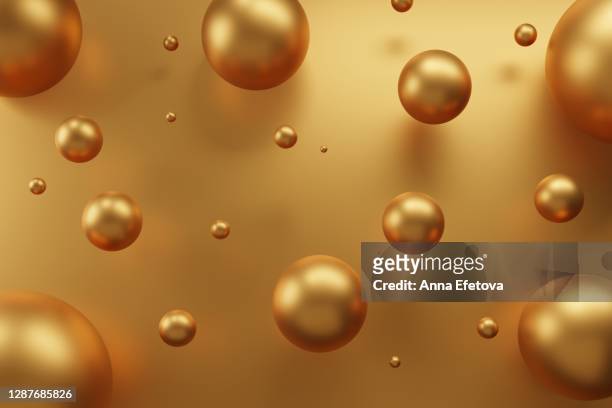 golden spheres on metallic background. new year ornaments concept. festive abstract background. - sphere stock pictures, royalty-free photos & images