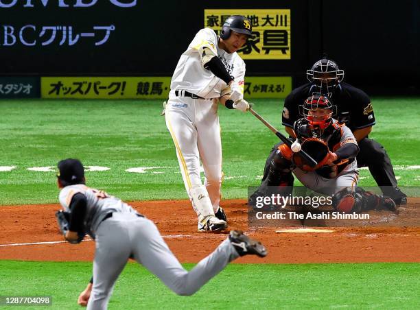 Yuki Yanagita of the Fukuoka SoftBank Hawks hits a two run home run to make it 1-2 in the 1st inning during the game four of the Japan Series against...