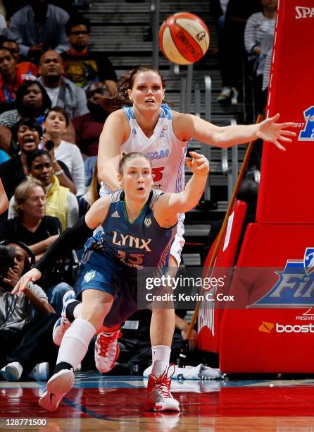 Lindsay Whalen of the Minnesota Lynx battles for a rebound against Alison Bales of the Atlanta Dream in Game Three of the 2011 WNBA Finals at Philips...