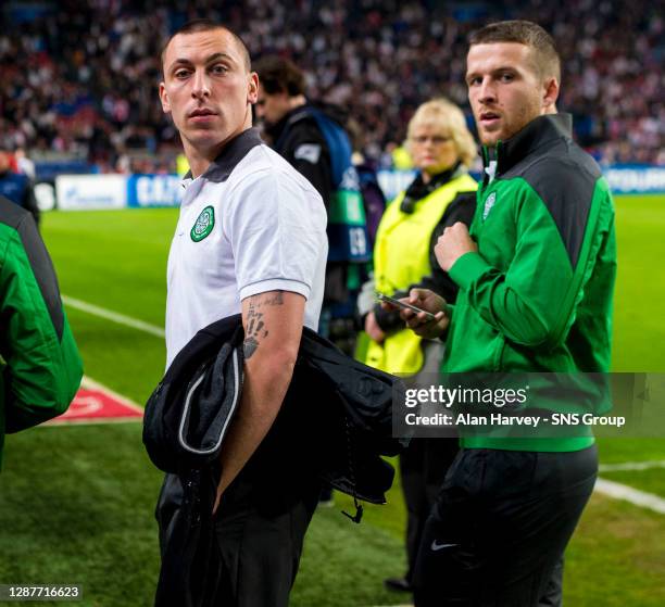 V CELTIC.AMSTERDAM ARENA - AMSTERDAM.Suspended Celtic captain Scott Brown with injured defender Adam Matthews