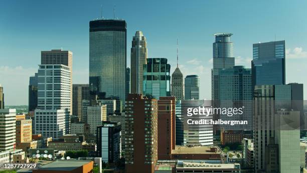 central business district skyscrapers in minneapolis - minneapolis drone stock pictures, royalty-free photos & images