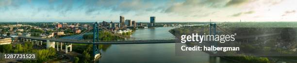 anthony wayne bridge stretching across maumee river in toledo, ohio - aerial panorama - ohio stock-fotos und bilder