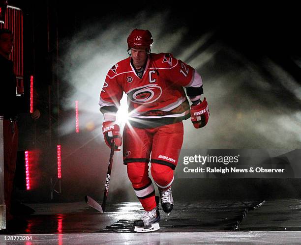 Carolina Hurricanes captain Eric Staal is introduced at the start of the home opener against the Tampa Bay Lightning at the RBC Center in Raleigh,...