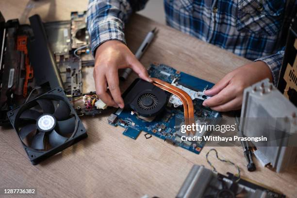 Computer Taken Apart Photos and Premium High Res Pictures - Getty Images