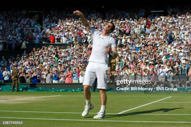 Novak DJOKOVIC Andy MURRAY .WIMBLEDON - LONDON.A shattered Andy Murray throws his sweatbands in to the crowd after claiming victory in the Wimbledon...