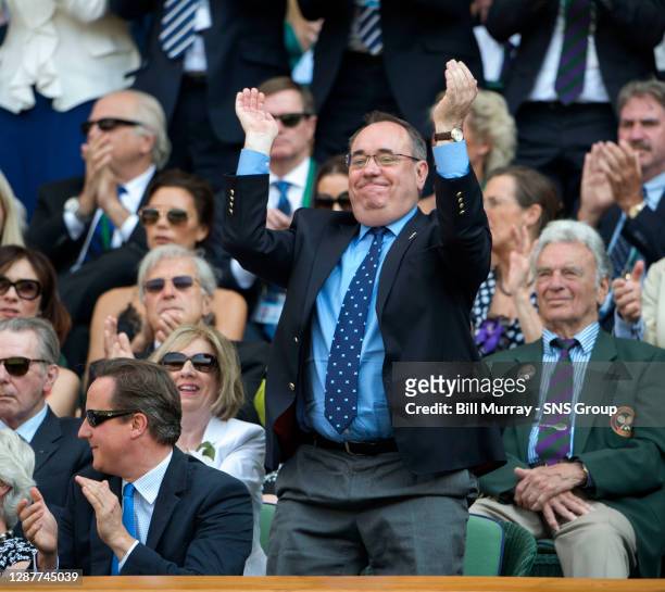 Novak DJOKOVIC Andy MURRAY .WIMBLEDON - LONDON.First Minister of Scotland Alex Salmond is on his feet in celebration.