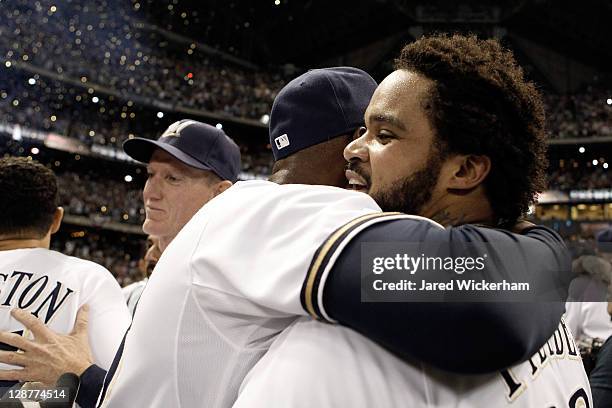 Prince Fielder of the Milwaukee Brewers celebrates with teammates after the Brewers defeat the Arizona Diamondbacks in Game Five of the National...