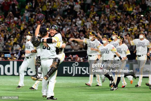 Fukuoka SoftBank Hawks players celebrate their 1-4 victory in the game four of the Japan Series at Fukuoka PayPay Dome on November 25, 2020 in...