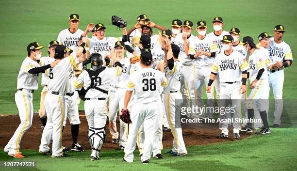 Fukuoka SoftBank Hawks players celebrate their 1-4 victory in the game four of the Japan Series at Fukuoka PayPay Dome on November 25, 2020 in...