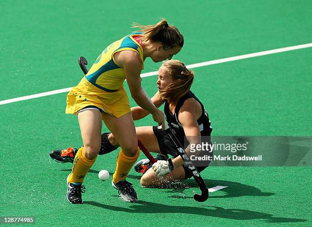 Emily Smith of the Hockeyroos competes with Lucy Talbot of the Blacksticks during the Oceania Cup match between New Zealand and Australia at Hobart...