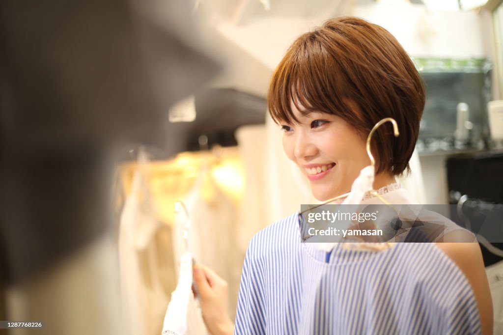 Woman choosing clothes