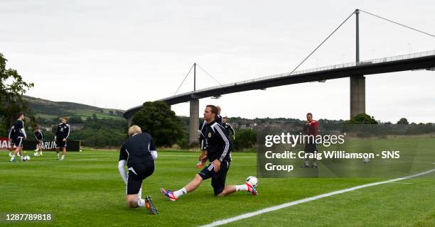 Scotland ace Andy Webster joins his fellow team mates at training ahead of the FIFA World Cup 2014 Qualifying double header against Serbia and...