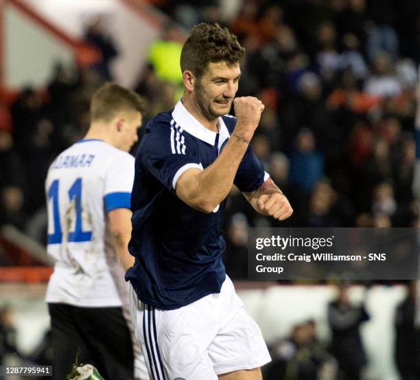 Scotland's Charlie Mulgrew celebrates opening the scoring.