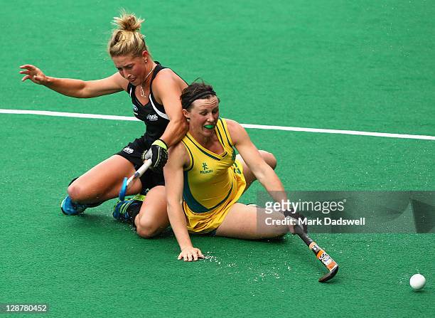 Claire Messent of the Hockeyroos competes with Sophie Devine of the Blacksticks during the Oceania Cup match between New Zealand and Australia at...
