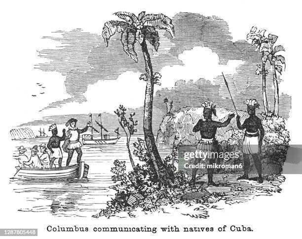 old engraved illustration of christopher columbus communicating with natives of cuba - christopher columbus natives fotografías e imágenes de stock