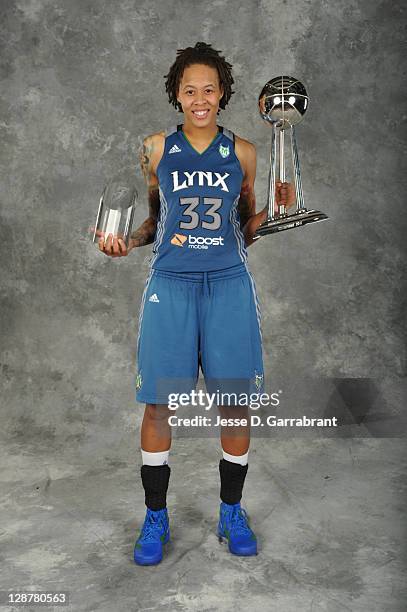 Seimone Augustus of the Minnesota Lynx poses for a portrait with the WNBA Trophy and MVP trophy after defeating the Atlanta Dream in Game Three of...