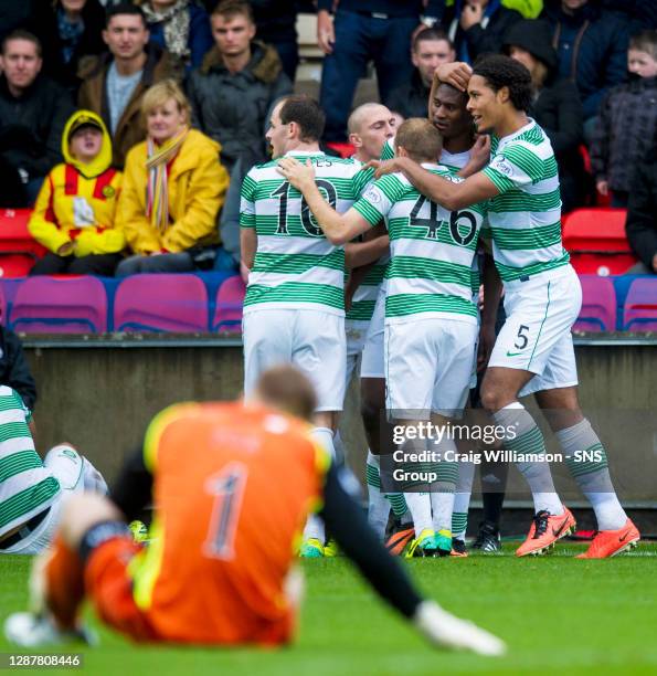 V CELTIC.FIRHILL - GLASGOW .Celtic's Amido Balde celebrates his goal with his team-mates.