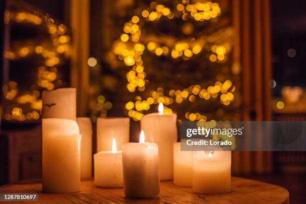 christmas decorations in xmas home - winter candlelight stock pictures, royalty-free photos & images