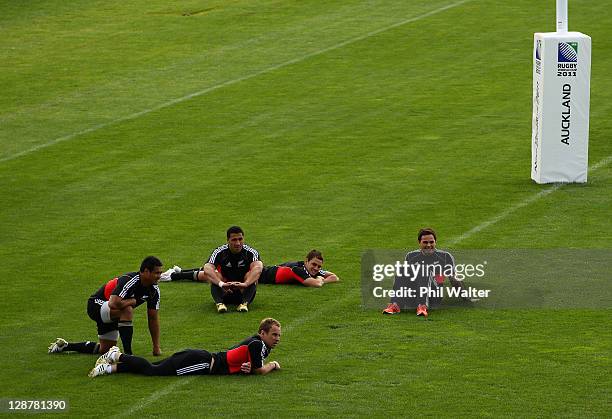 Isaia Toeava, Mils Muliaina, Jimmy Cowan, Israel Dagg and Zac Guildford relax on the field during a New Zealand IRB Rugby World Cup 2011 captain's...