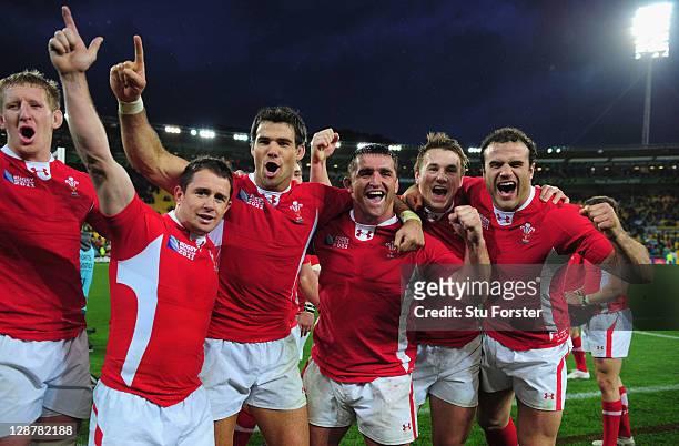 Bradley Davies, Shane Williams, Mike Phillips, Huw Bennet, Jonathan Davies and Jamie Roberts celebrate after quarter final one of the 2011 IRB Rugby...