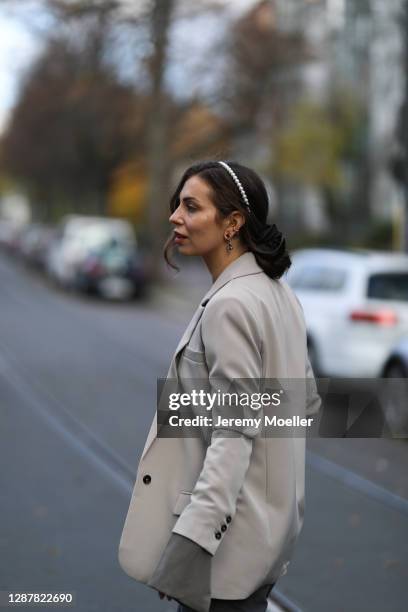 Masha Sedgwick wearing Designers Remix blazer, Zara hair cuf on November 20, 2020 in Berlin, Germany.