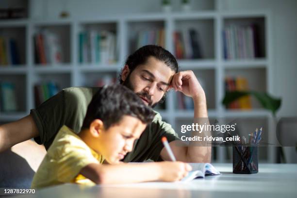 boy having problems in finishing homework - homework help stock pictures, royalty-free photos & images