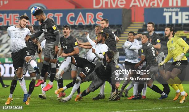 Kasey Palmer of Swansea City and team mates up for a last minute corner cause bedlum in the penalty area during the Sky Bet Championship match...