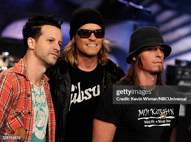 Musicians Doug Ardito, Wes Scantlin and Paul Phillips of Puddle of Mudd appear on the Tonight Show With Jay Leno at NBC Studios on October 7, 2011 in...