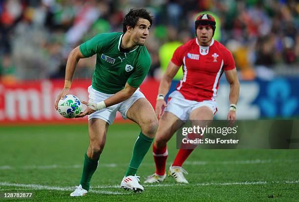 Conor Murray of Ireland looks to dispatch the pass during quarter final one of the 2011 IRB Rugby World Cup between Ireland v Wales at Wellington...