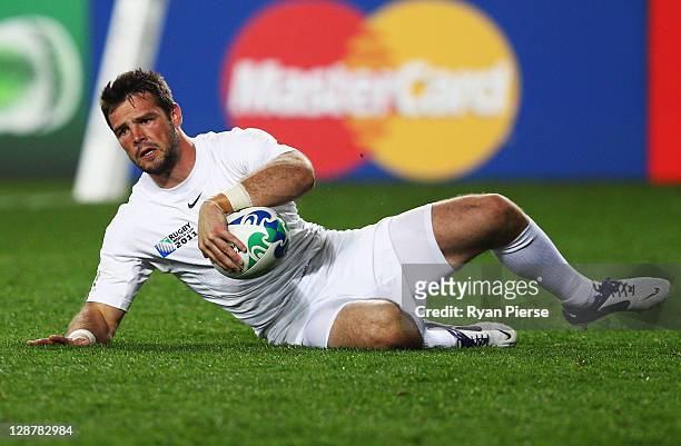 Ben Foden of England goes over to score his try during quarter final two of the 2011 IRB Rugby World Cup between England and France at Eden Park on...