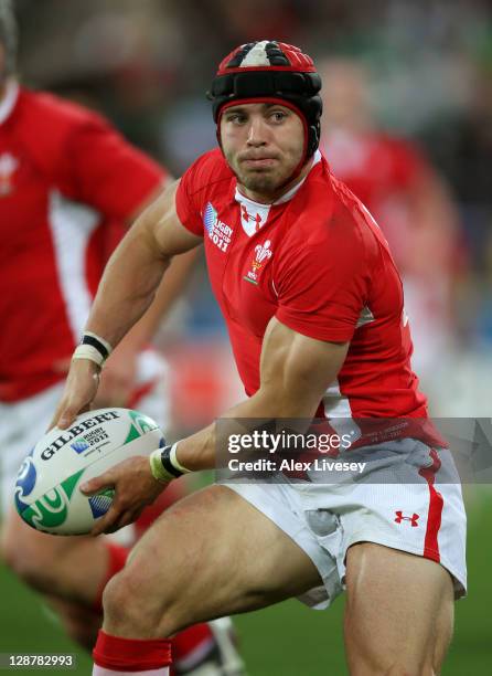 Leigh Halfpenny of Wales make a run during quarter final one of the 2011 IRB Rugby World Cup between Ireland v Wales at Wellington Regional Stadium...