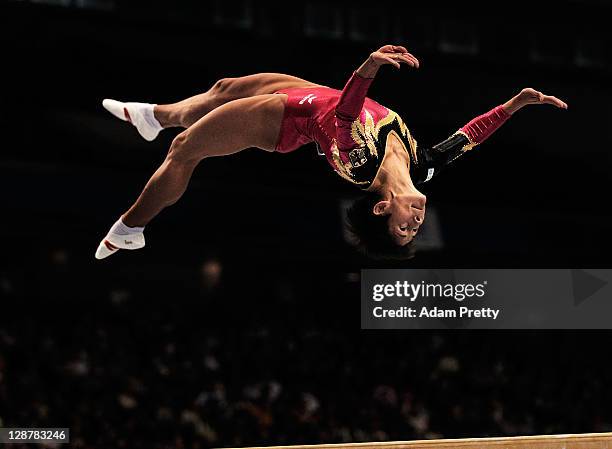 Oksana Chusovitina of Germany competes on the Beam aparatus in the Women's qualification during day two of the Artistic Gymnastics World...