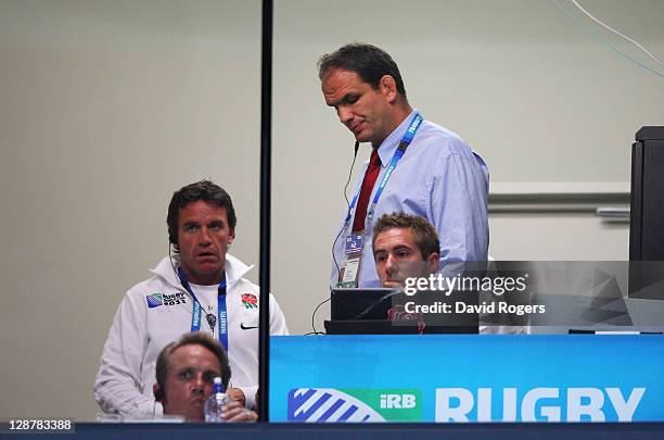 Martin Johnson, manager of England looks dejected in the coaches box during quarter final two of the 2011 IRB Rugby World Cup between England and...