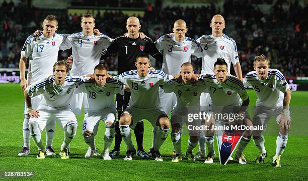 The team of Slovakia pose for a group photo during the EURO 2012, Group B qualifier between Slovakia and Russia at the MSK Zilina stadium on October...