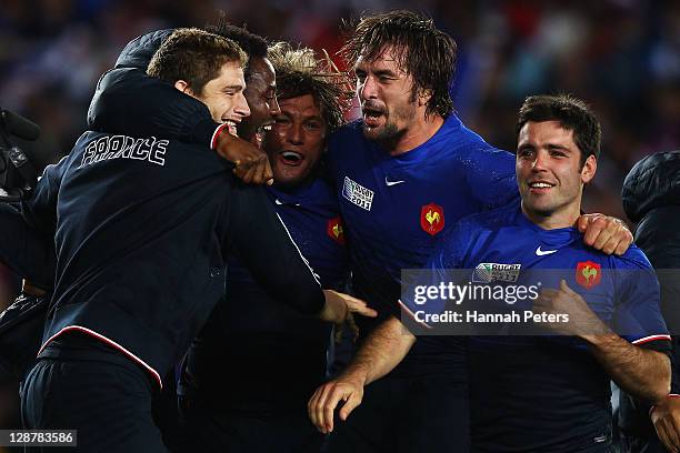 Pascal Pape, Fulgence Ouedraogo, Dimitri Szarzewski, Lionel Nallet and Dimitri Yachvili of France celebrate victory at the final whistle after the...