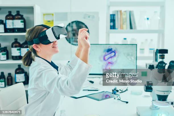 the future of medicine looks brighter everyday - virtual reality medical stock pictures, royalty-free photos & images