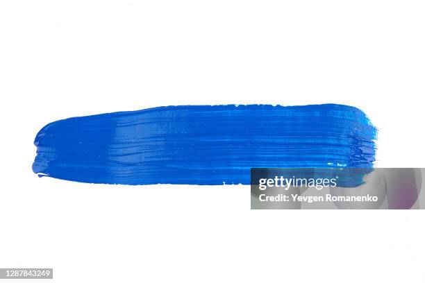 blue brush stroke isolated on white background - brush paint stock-fotos und bilder