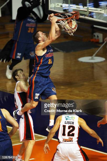 Mitchell Creek of the 36ers dunks the ball during the round one NBL match between the Adelaide 36ers and the Perth Wildcats at Distinctive Homes Dome...