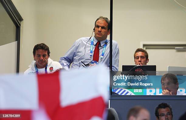 Martin Johnson, the England manager looks on as his team are defeated during quarter final two of the 2011 IRB Rugby World Cup between England and...