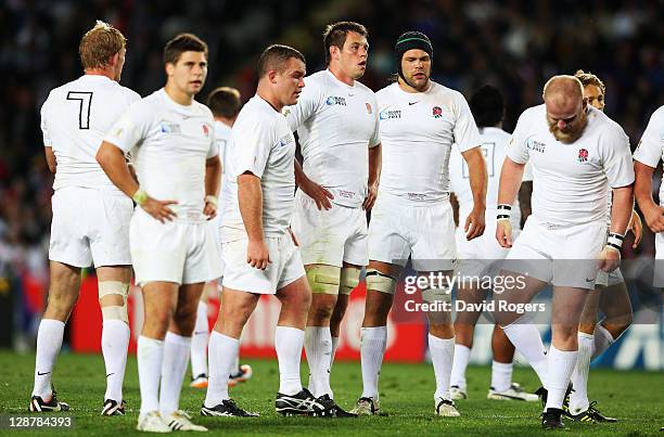 England look dejected following their defeat during quarter final two of the 2011 IRB Rugby World Cup between England and France at Eden Park on...