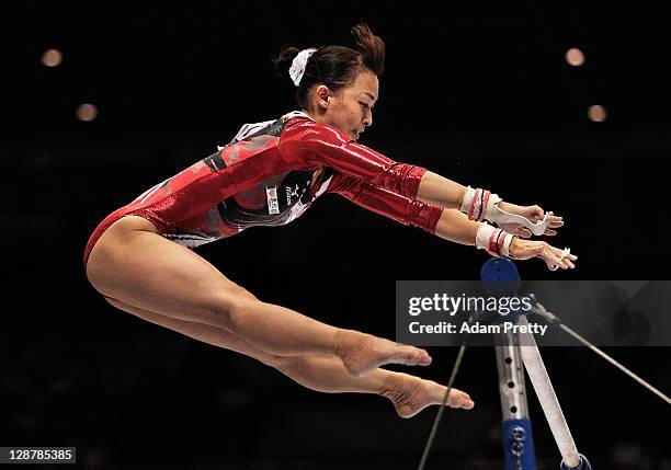 Rie Tanaka of Japan competes on the Uneven Bars aparatus in the Women's qualification during day two of the Artistic Gymnastics World Championships...