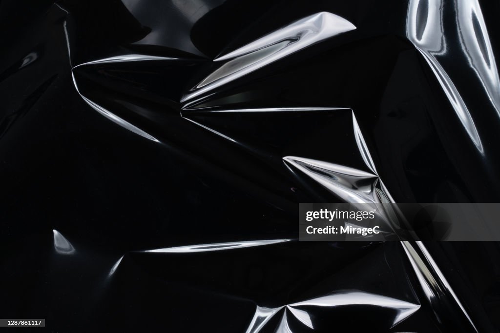 Crumpled Plastic Foil Reflecting White Light