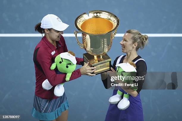 Katarina Srebotnik of Slovakia and Kveta Peschke of the Czech Republic pose for photographers after defeating Gisela Dulko of Argentina and Flavia...