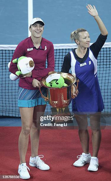 Katarina Srebotnik of Slovakia and Kveta Peschke of the Czech Republic pose for photographers after defeating Gisela Dulko of Argentina and Flavia...