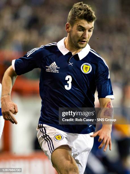 Charlie Mulgrew in action for Scotland.